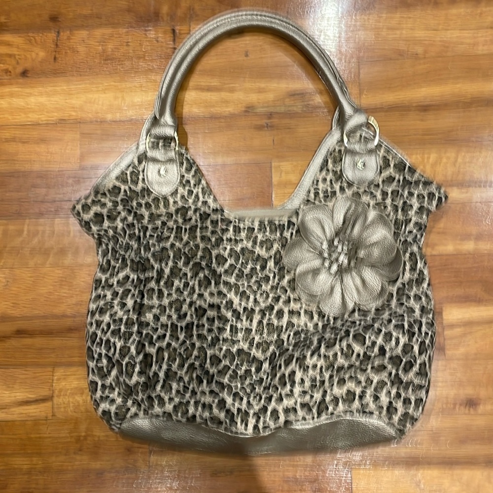Woman animal print gold bow bag not new but looks like new good condition